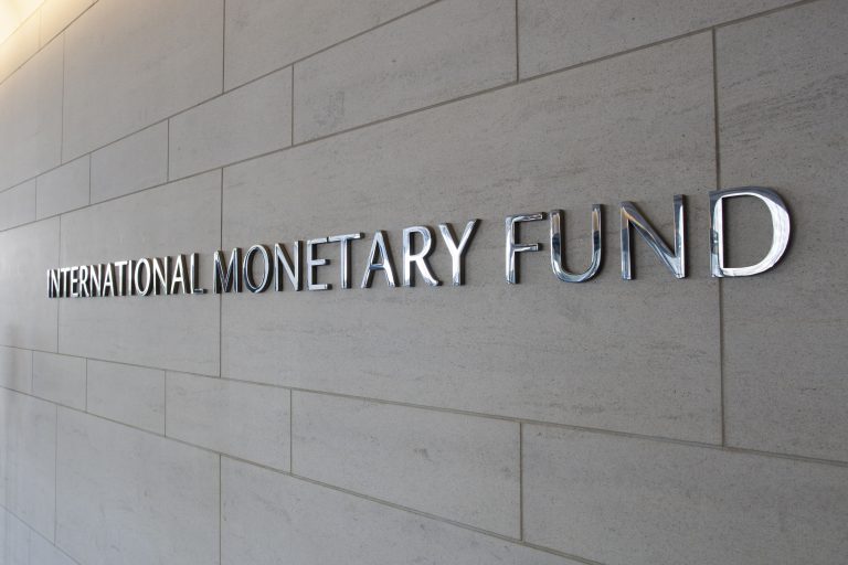 International Monetary Fund logo on wall
