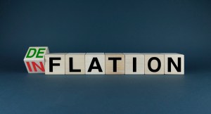 Blocos formando a palavra "deflação"